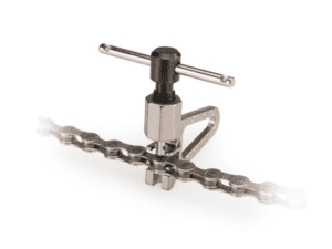 The CT-5 Chain Tool performs like a shop-quality tool, in a lightweight compact size that easily fits in a saddle bag or mobile mechanic's tool roll. The CT-5 removes and installs pins on all 5-to-12-speed derailleur chains, including newer SRAM® 12-speed designs. The integrated loosening shelf is useful for adjusting tight links on older style chains.