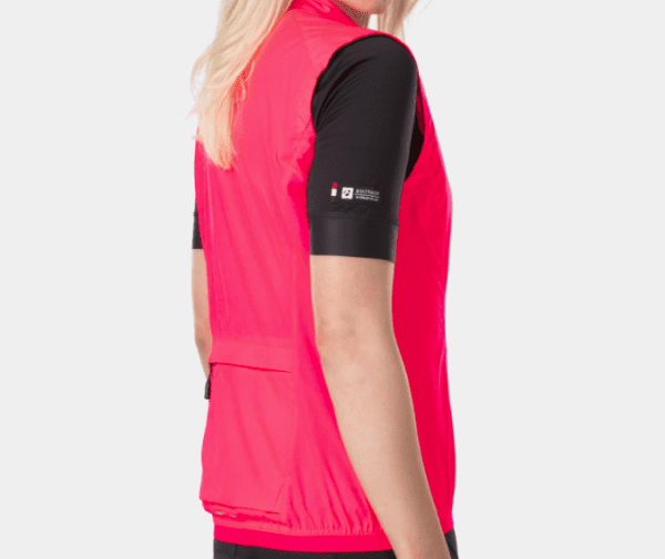 The Circuit Women's Windshell Vest is an ultralight packable vest essential for crisp windy rides when your core needs protection. Not only is this vest windproof, but it also features a full-length zip for excellent temperature regulation, and has an extended rear drop-tail design for coverage against road spray.